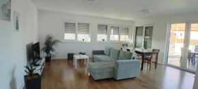 Neubau Appartement mit Terasse, privater Eingang,Parkplatz,Küche